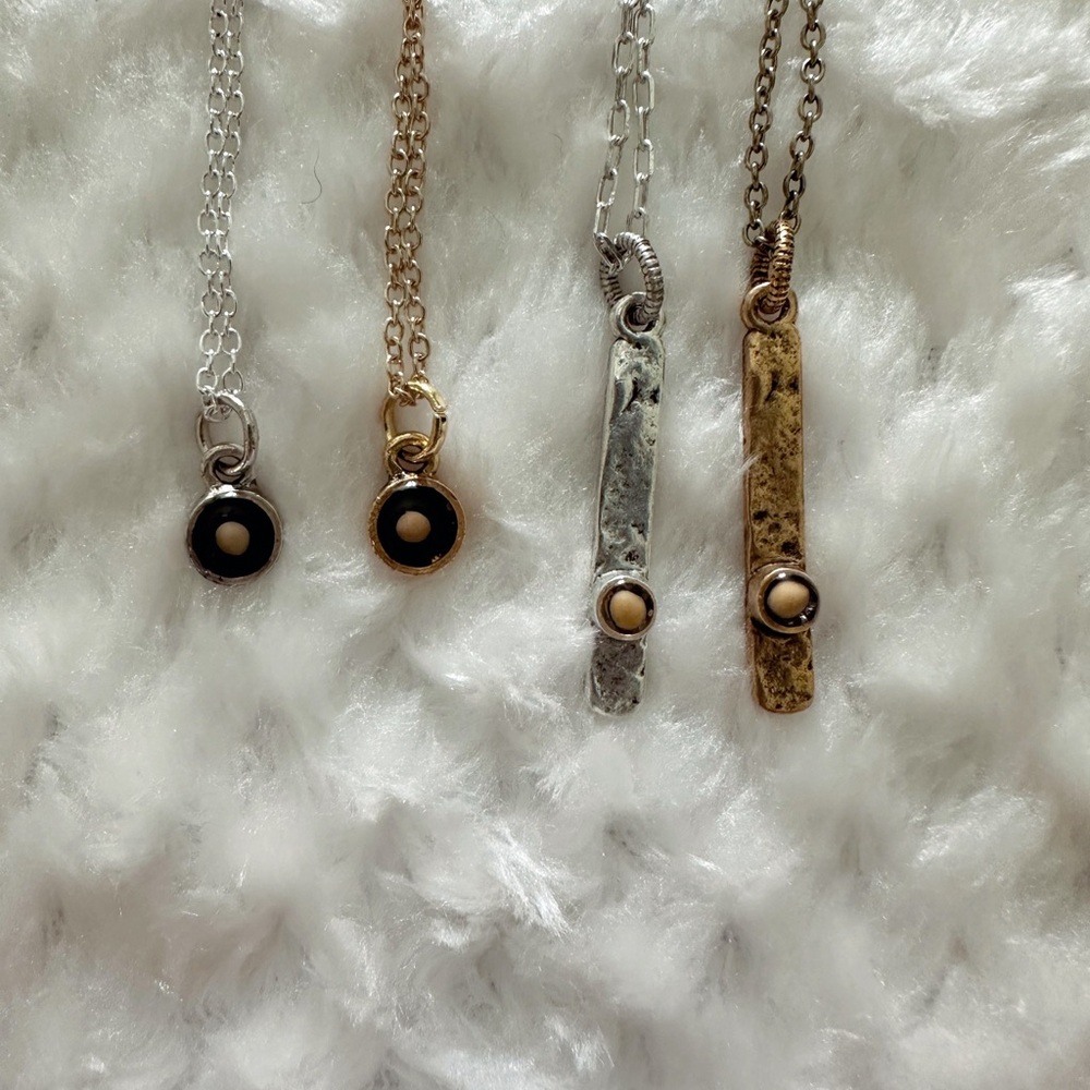 Handcrafted mustard seed necklaces.